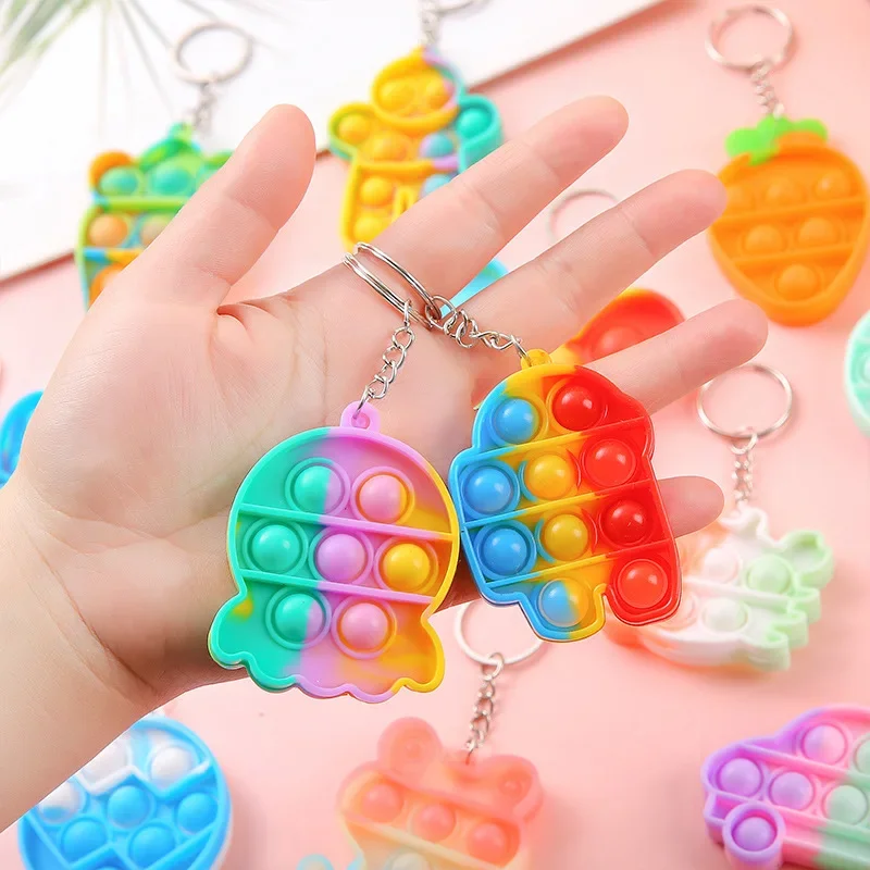 5 Pcs opular Stress Relief Kids Toy Keychain, Mouse Killer, Pioneer Pendant, Finger Bubble, Fidget Toy