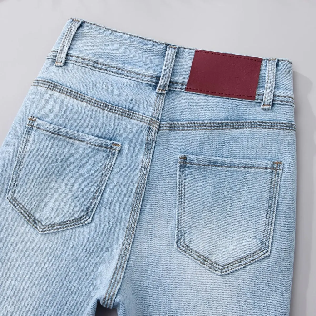 Pantaloni svasati azzurri da donna a vita alta pantaloni in denim morbido solido filo laterale stivali elasticizzati jeans tagliati S-2XL jeans lunghi femminili