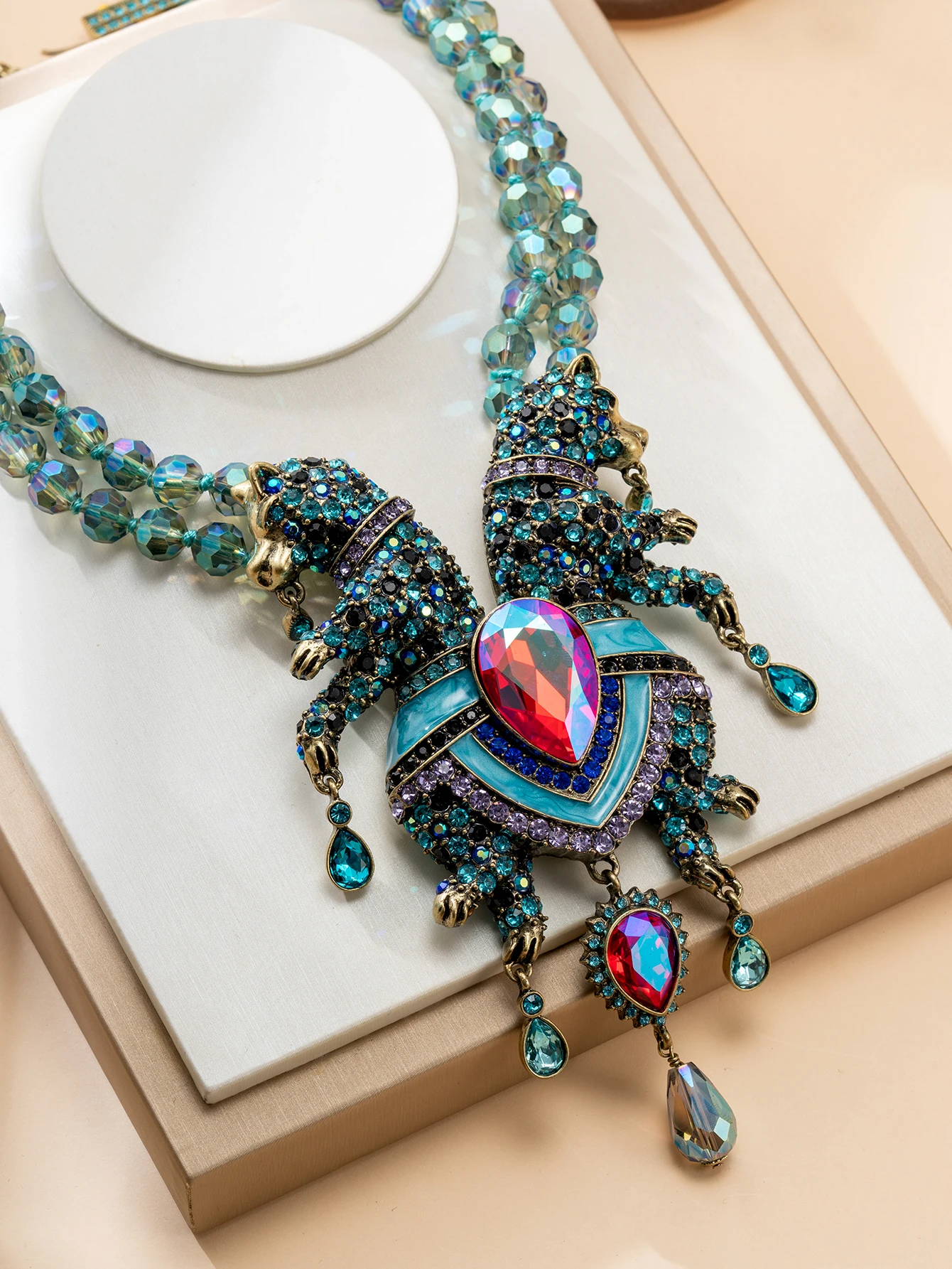 heavy-duty-double-beast-gemstone-pendant-necklace-multi-faceted-blue-crystal-vintage-dress-accessory