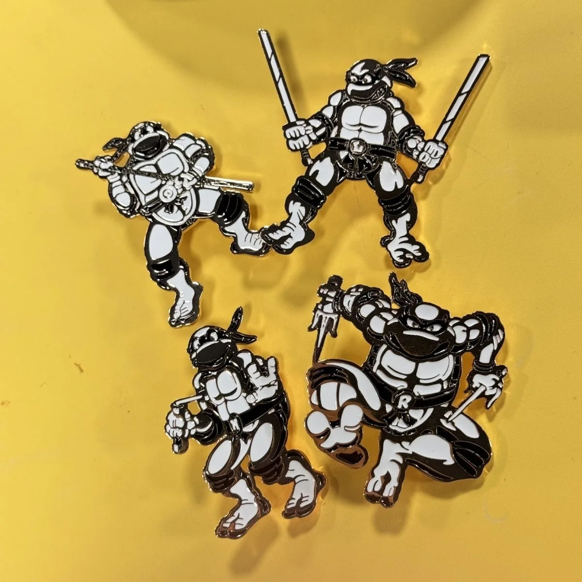 Cool enamel pin of a sci - fi warrior wielding a giant weapon. Vibrant colors, unique design. A must - have for genre fans.