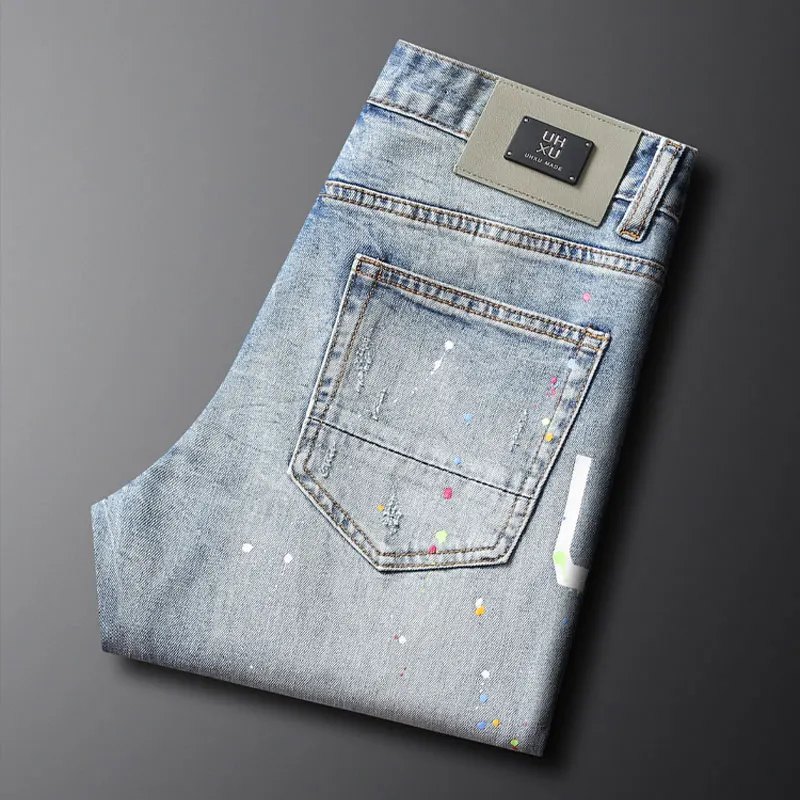 Jeans da uomo di moda di strada retrò blu chiaro Stretch Slim Fit Jeans strappati con patch da uomo pantaloni di Jeans Hip Hop firmati dipinti Hombre