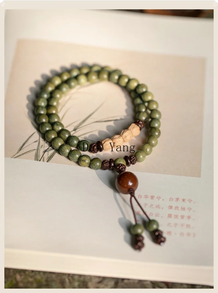 Green sandalwood Buddha bead bracelet, old sandalwood passion seeds, holding long rosary beads, male and female students playing