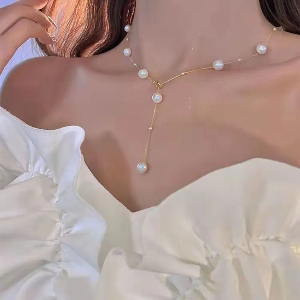 Collar trasero de perlas de imitación Simple, joyería ligera, colgante de perlas con borlas, arnés, Bikini, cadena para el pecho para mujer