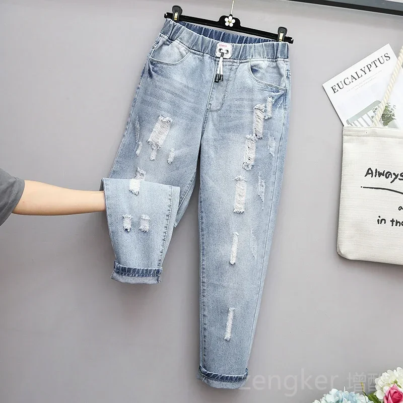 Large size jeans women loose harem pants ninth pants hole 5XL 4XL high waist pants plus size ripped jeans for women