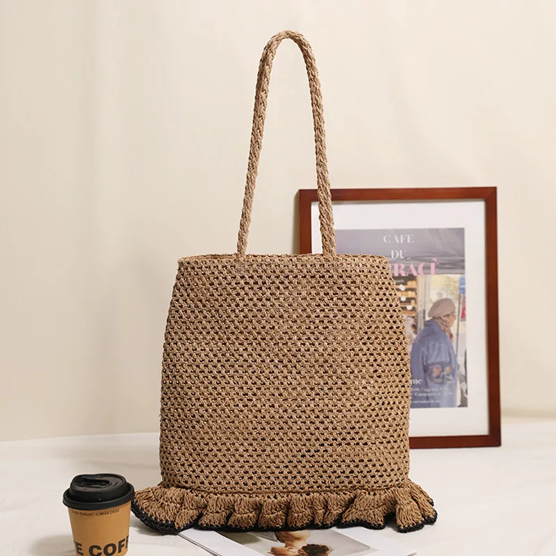 

2026 New Fashion Woven Straw Beach Bag Pleated Lace Tassel Shoulder Handbag Brand Design Skirt Seaside Vacation Grass Tote Bag