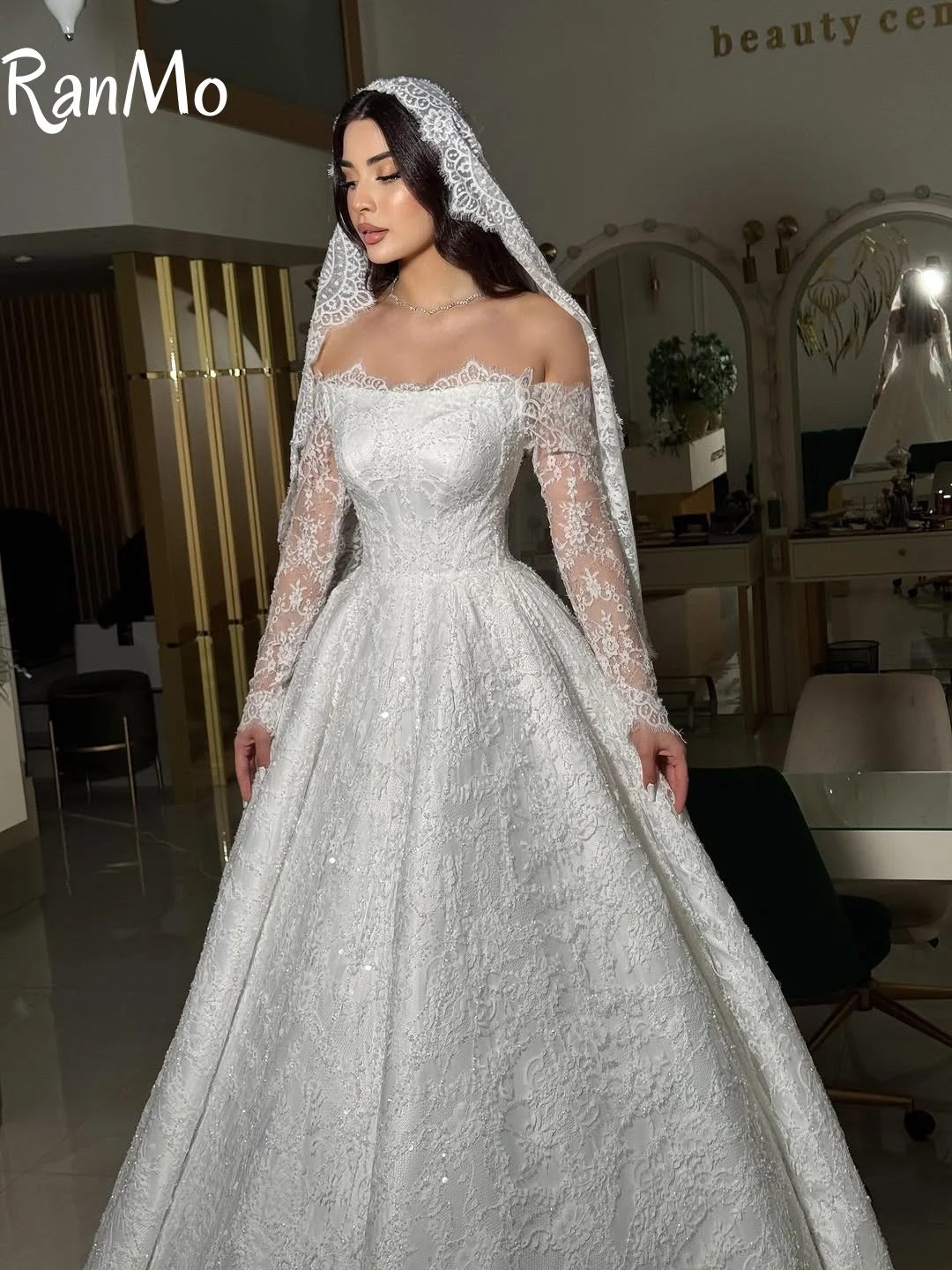 Ranmo ประณีตแขนยาวชุดแต่งงาน Sparkly ปิดไหล่ Backless หรูหรา Sweep Train ชุดเจ้าสาวสําหรับผู้หญิง 2025