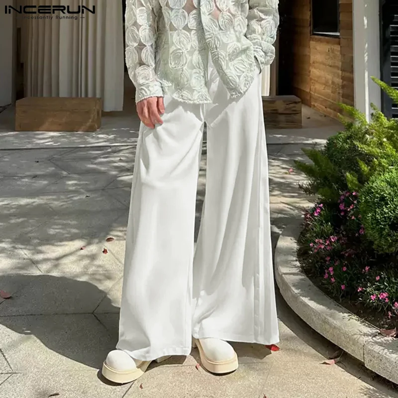 

INCERUN Men Wide Leg Pants Pleated Joggers Solid Color Loose Casual Trousers Men Streetwear 2025 Button Fashion Male Long Pants