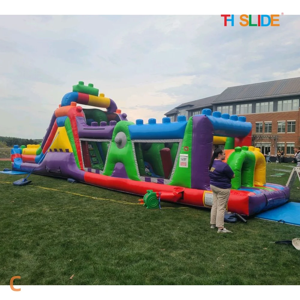 Par navire à porte, jeux de sport gonflables colorés pour parcours d'obstacles de 15x3m, toboggans d'eau gonflables commerciaux à double voie et piscine
