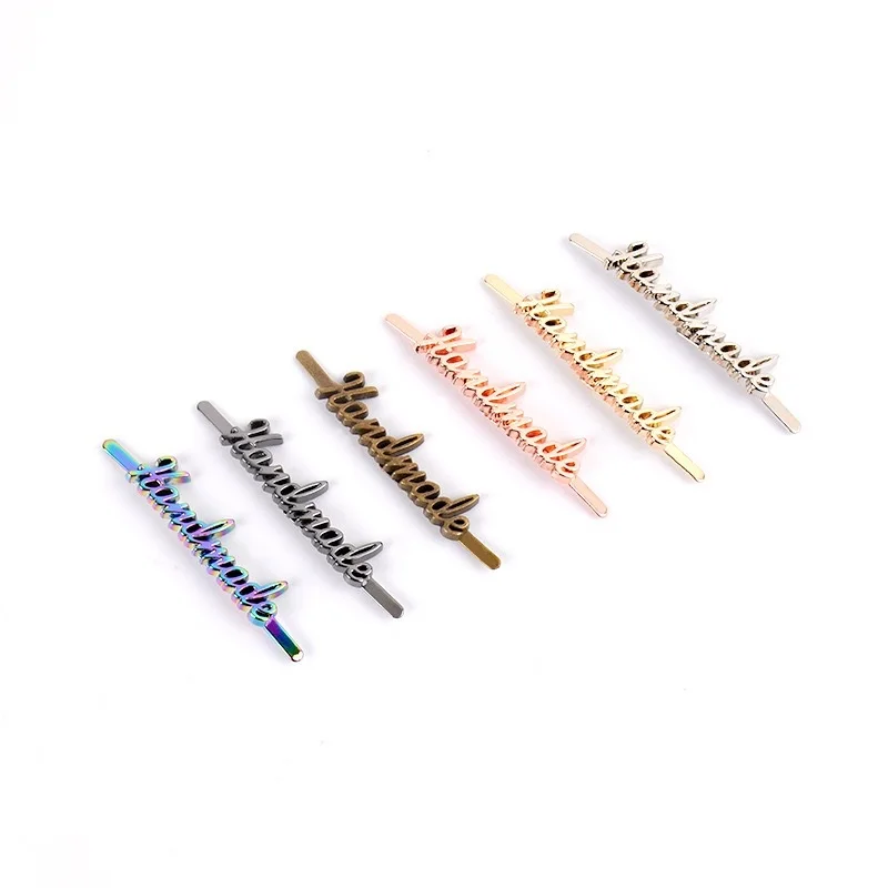 Custom metal letter labels, metal Custom labels logo personalized custom metal labels suitable for clothing bags hats and shoes.