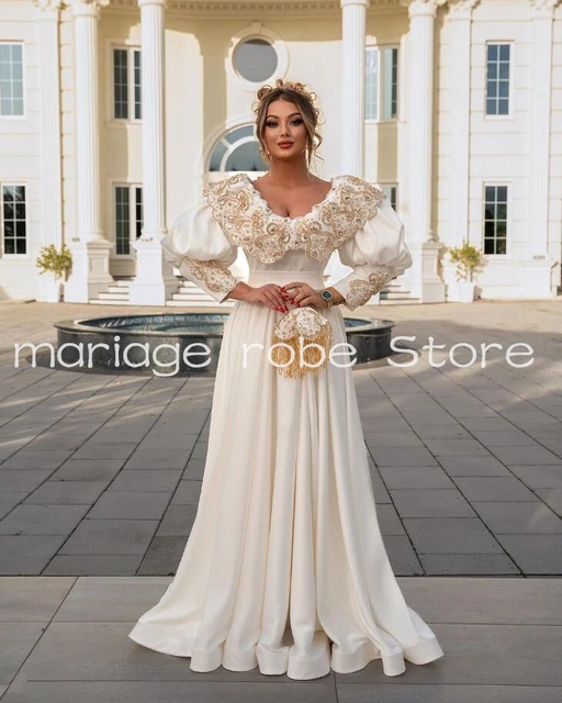 Robe de soirée blanche manche longue sale