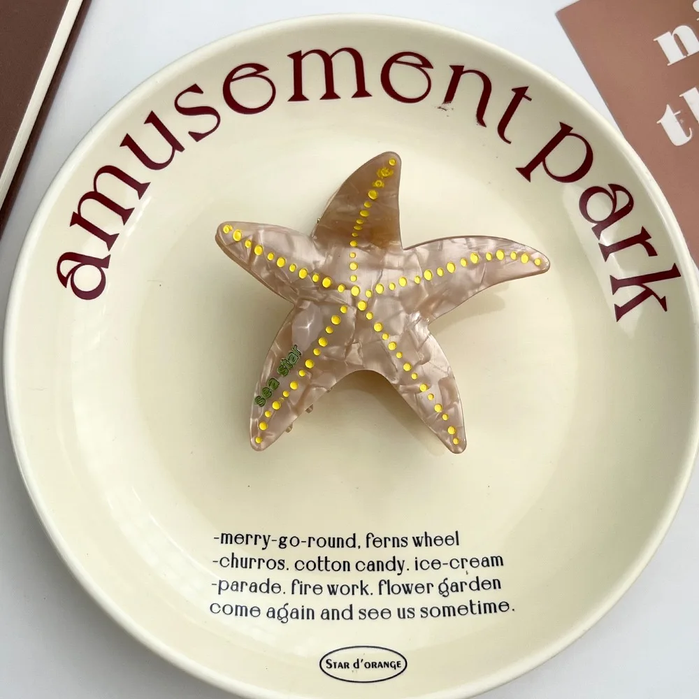 مخلب نجم البحر: نمط ترفيهي بحري وفريد من نوعه، مصنوع يدويًا من مادة الأسيتات عالية الجودة، وتجسيد الموضة والتري