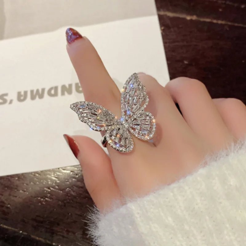 European and American classic hollow out trend zircon resistant butterfly opening adjustable ring personality ring wedding gift