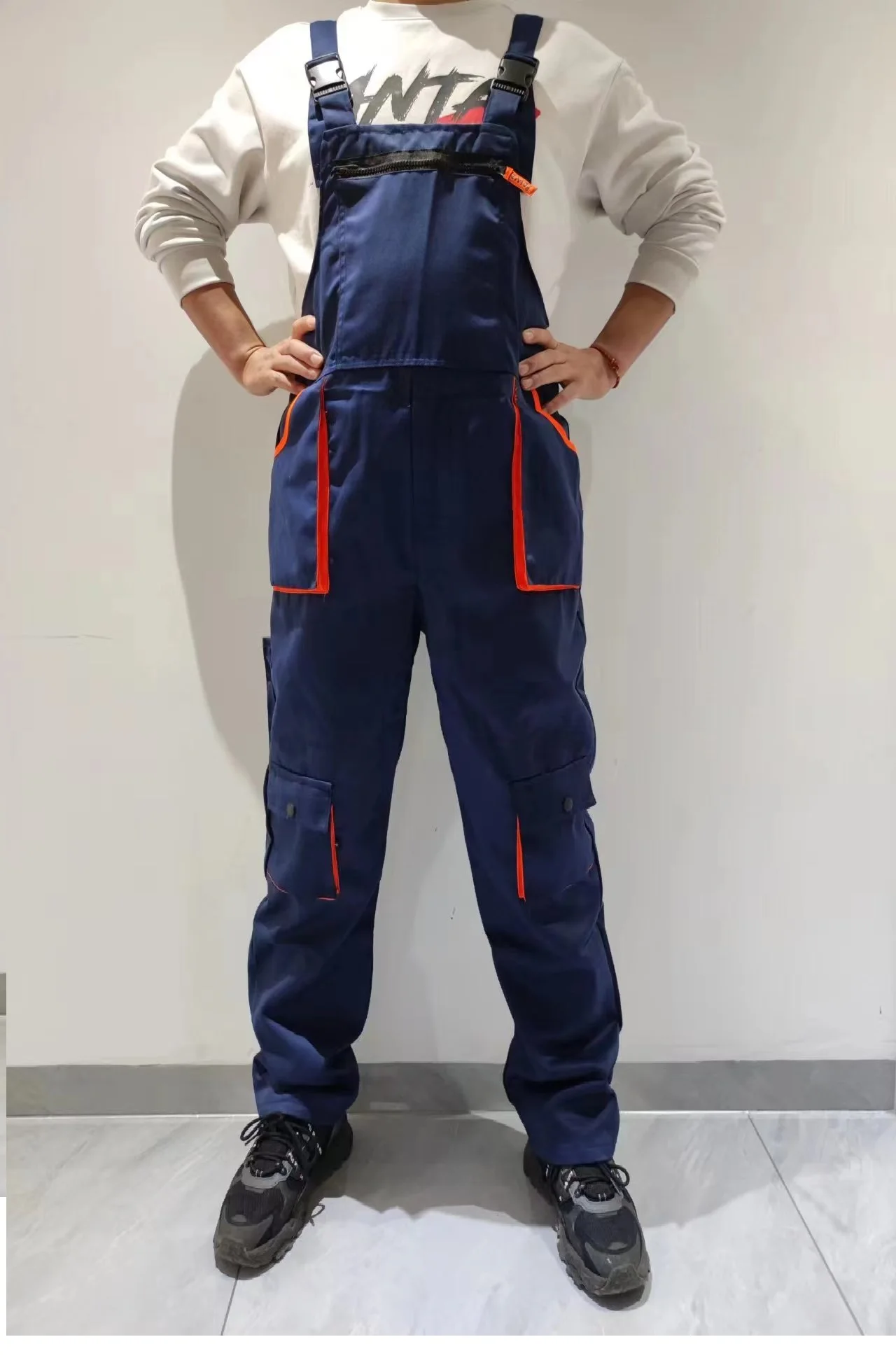 Monos con pechera para hombre y mujer, ropa de trabajo de talla grande, monos protectores, mono con tirantes, uniforme con múltiples bolsillos,