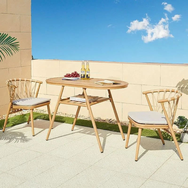 

Outdoor balcony drinking tea table and chairs Small apartment rattan Internet celebrity reading reading and reading leisure