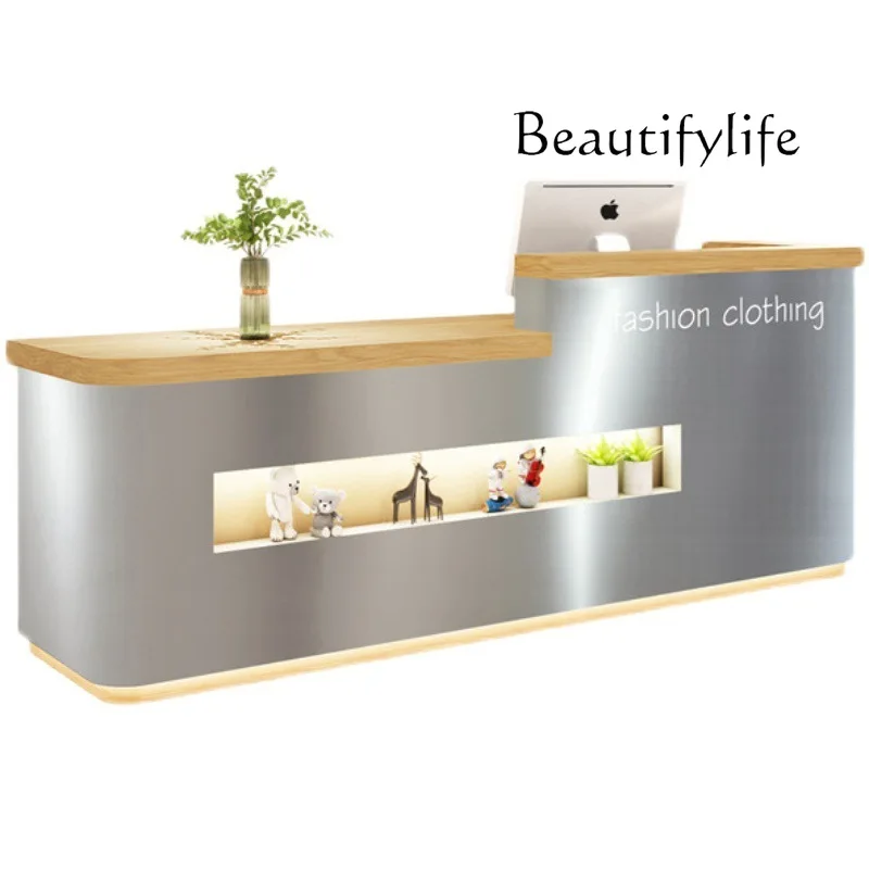 

Light luxury stainless steel checkout page store small clothing store beauty hair shop simple modern reception desk