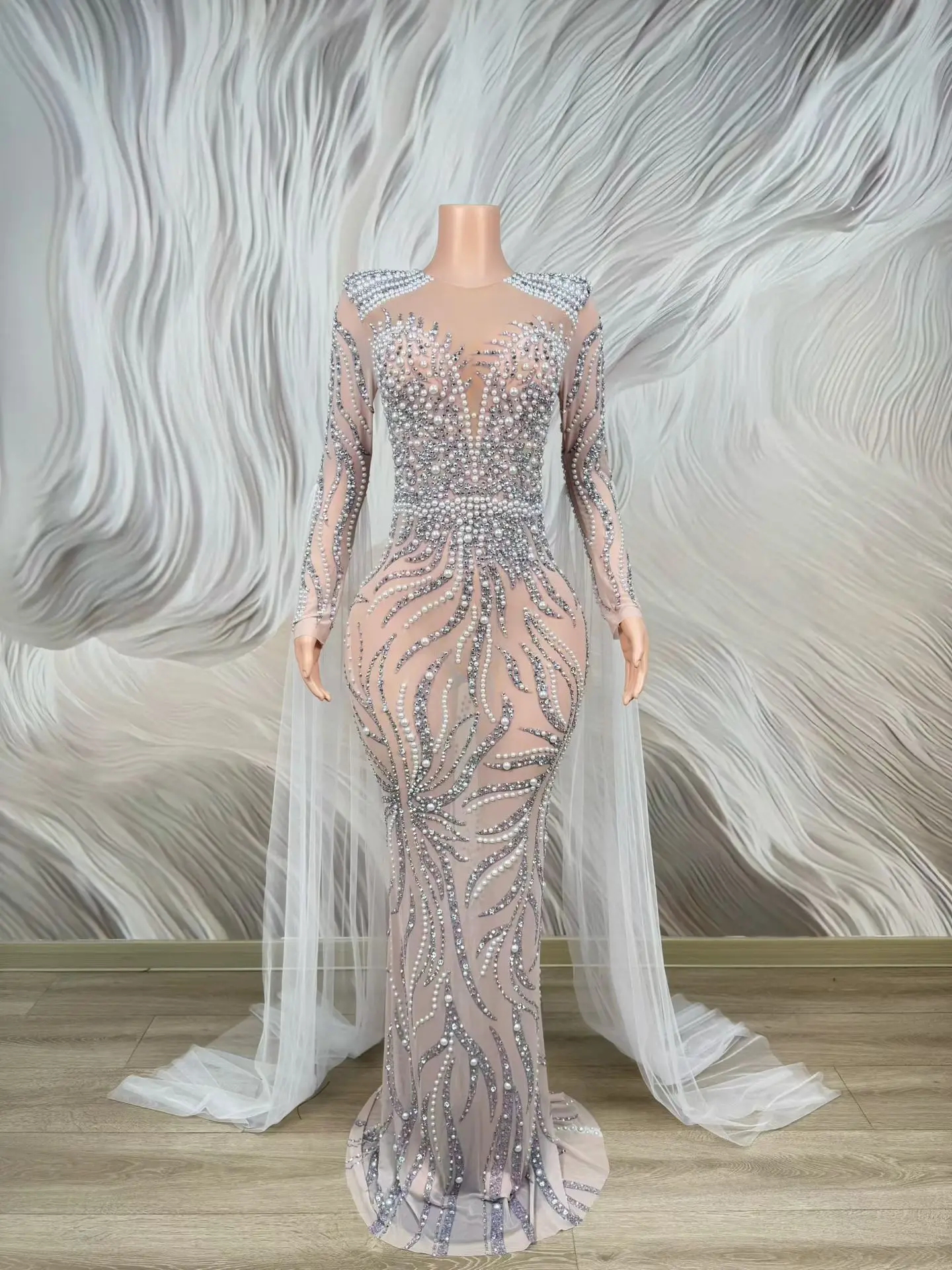 

Baiye Nude Mesh Long Sleeve Evening Gown with Silver Rhinestone Pearl Wave Patterns and Flowing Tulle Cape for Formal Occasions