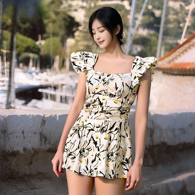 ชุดว่ายน้ำแฟชั่นเกาหลีสุดเซ็กซี่ ลายดอกไม้ระบาย ชุดว่ายน้ำวันพีซ ชุดเดรสสั้นจับจีบ ชุดบิกินี่แบบกางเกงขาสั้น ชุดว่ายน้ำเสริมฟองน้ำ ชุดว่ายน้ำแบบแทงกินี่