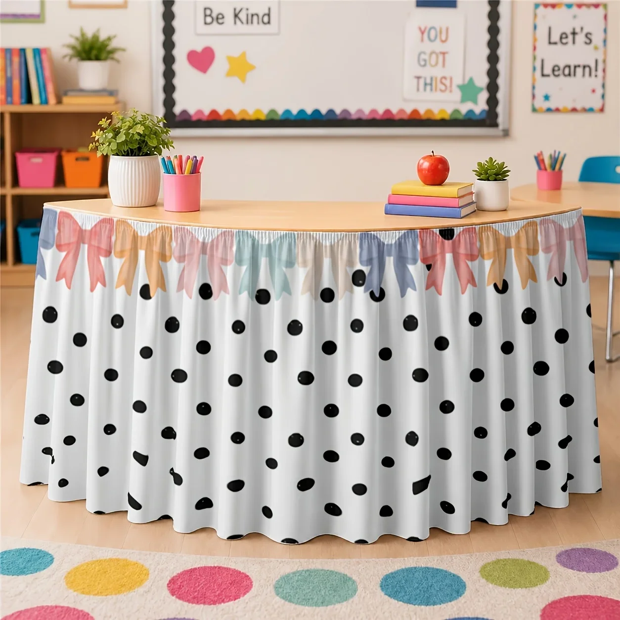 One table skirt. Printed polyester. Fun colorful polka dot and bow decoration. Suitable for dining tables, kitchens and offices.