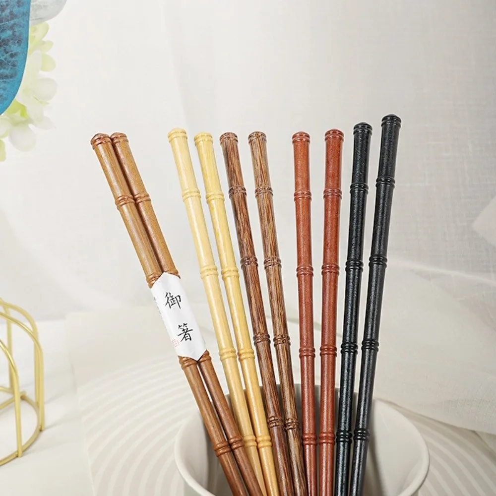 1 par de palillos de madera Retro de alta gama, palillos de Sushi hechos a mano de estilo japonés, palillos puntiagudos de Color sólido con forma de bambú