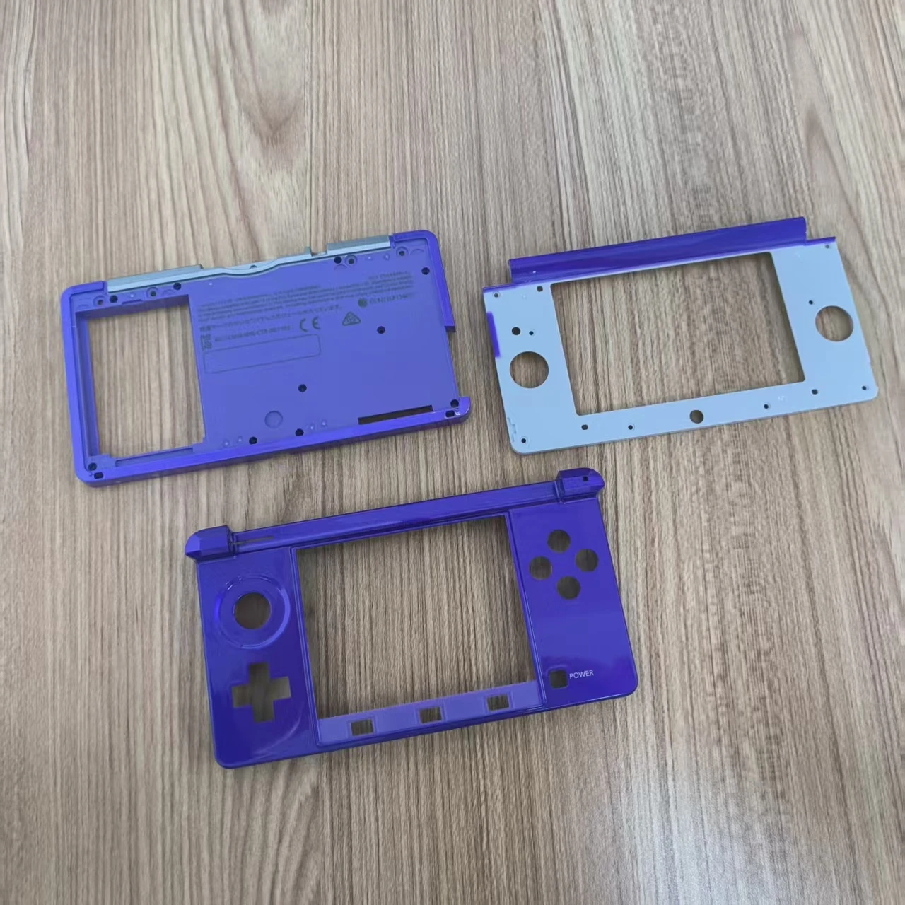 Scatola protettiva a conchiglia per copertura alloggiamento con cornice centrale colorata originale per console 3DS