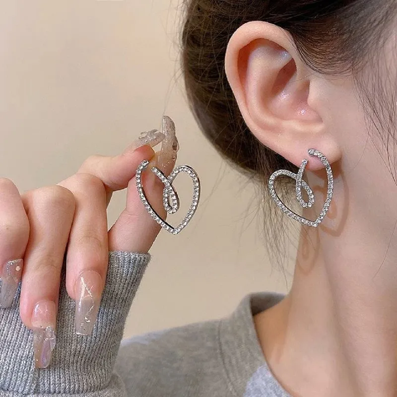 Pendientes de boda grandes con diseño hueco, joyería de temperamento para niña, exquisitos pendientes en forma de corazón, circonita cúbica brillante para mujer