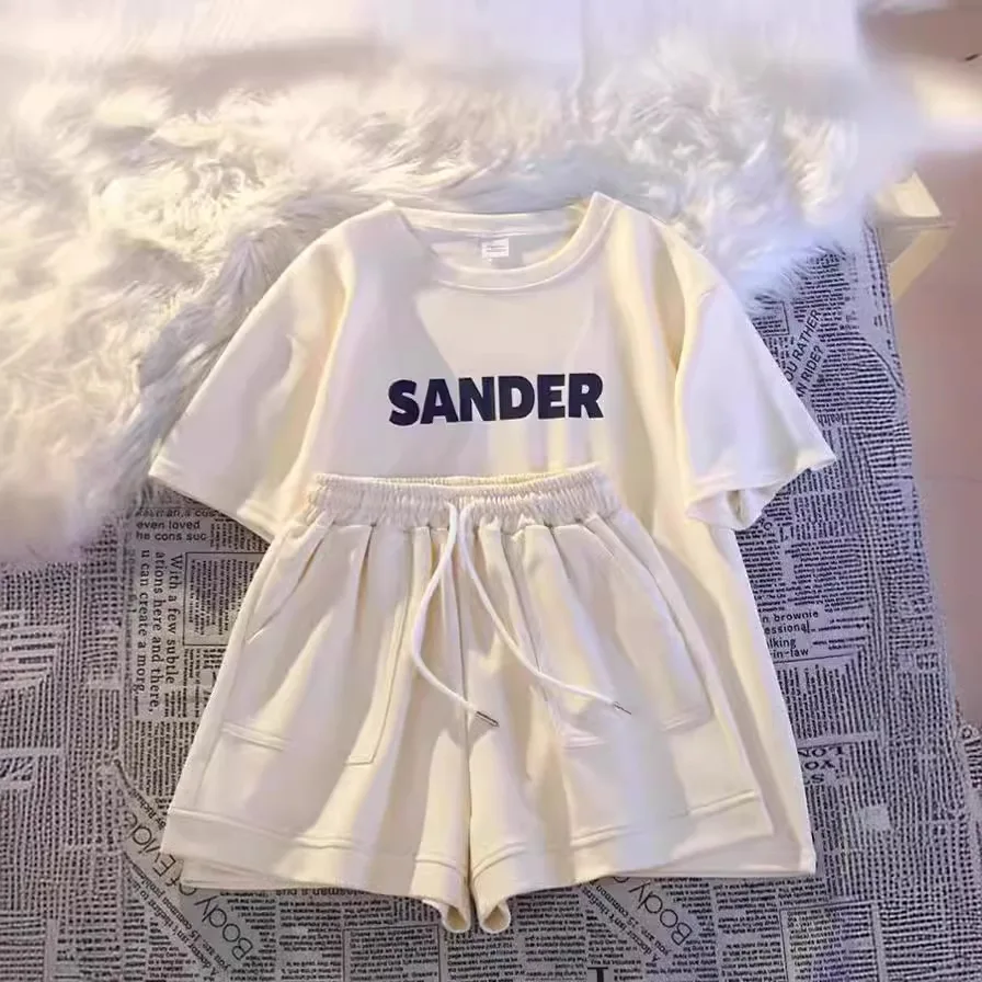 

Летние женские спортивные спортивные костюмы с буквенным принтом и этикетками, повседневные укороченные топы + шорты, уличная одежда, комплекты из двух предметов, одинаковый костюм