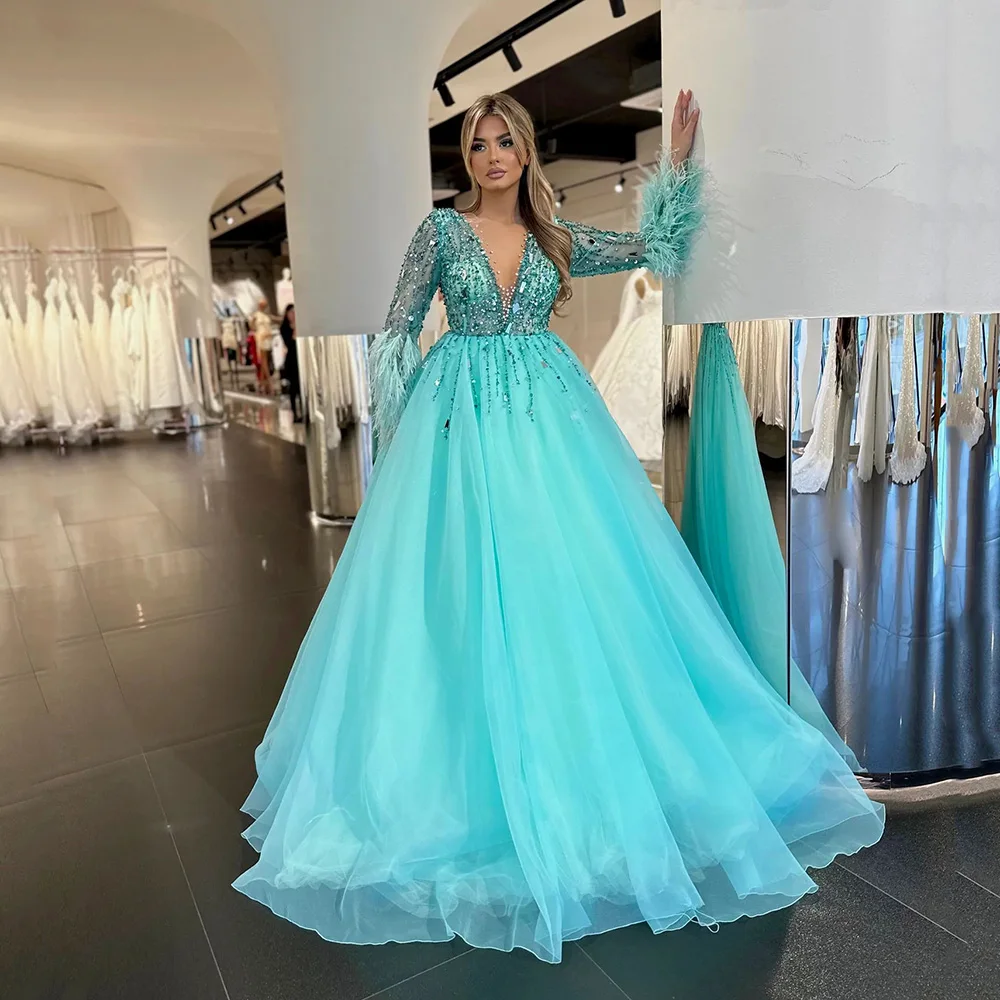 

Yipeisha Ice Blue Quinceanera Dresses with Sleeves Deep V-neck Beaded Ball Gown Masquerade Feathers Sweet 15 Dress