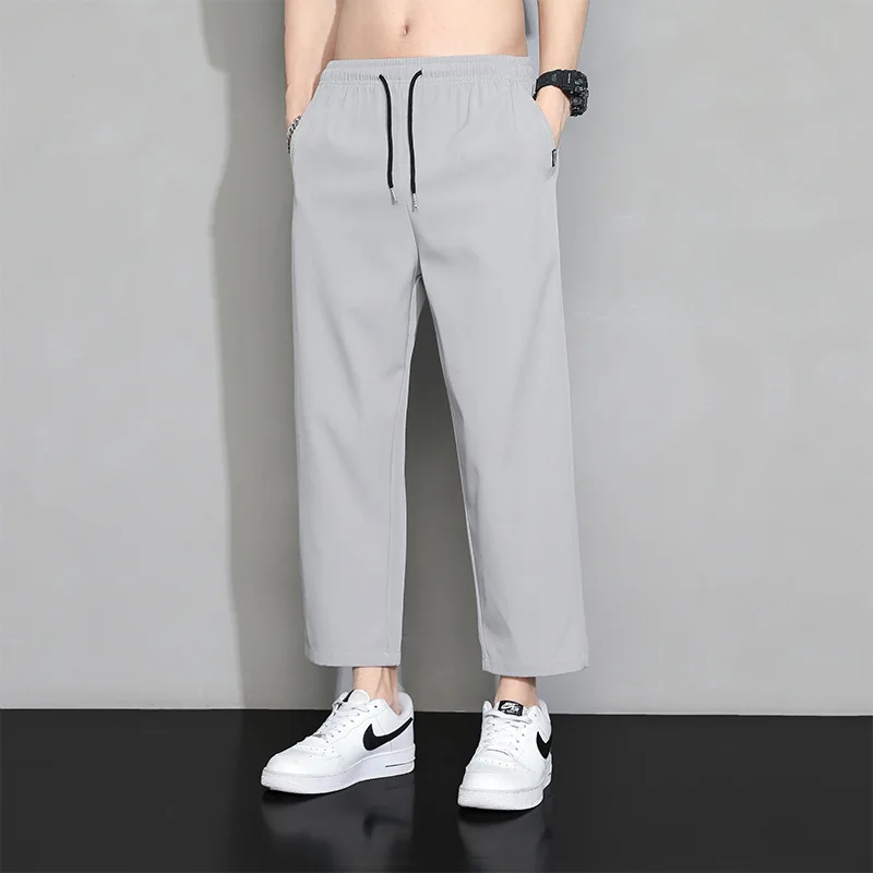 الرجال الرياضة التجفيف السريع تنفس السراويل اليومية غير رسمية الرجال الصيف الحرير الجليد رقيقة السراويل مطاطا الرباط طماق وزرة