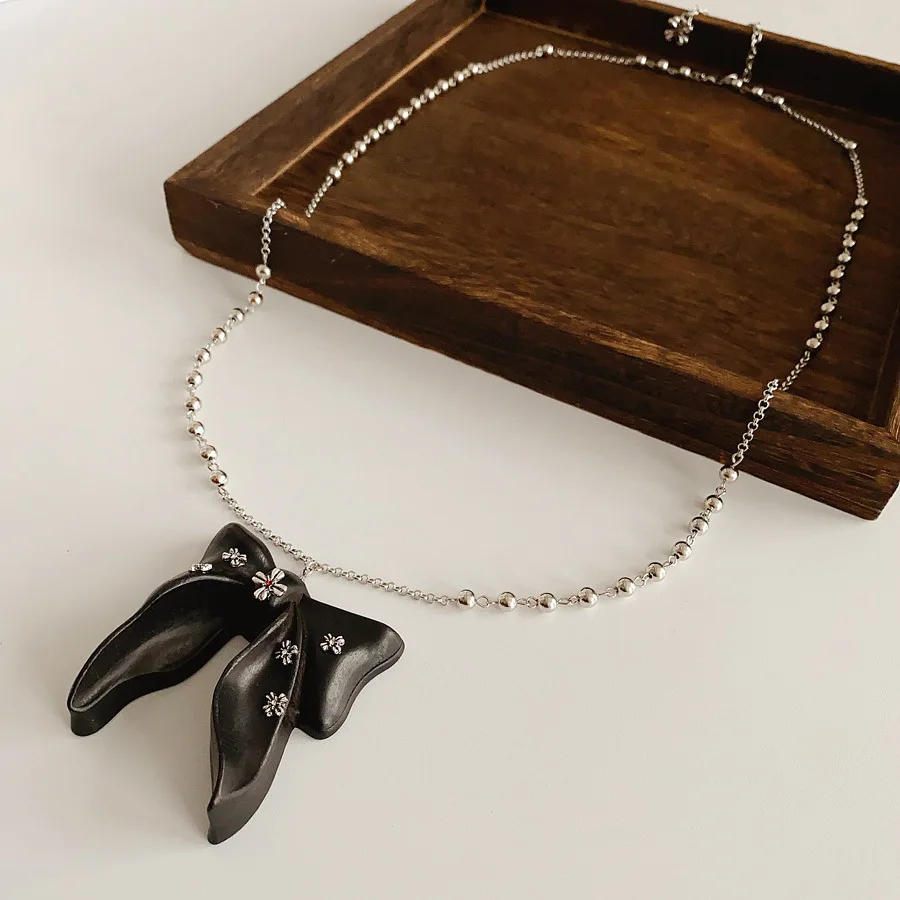 

NISHIZAWA Bowknot Pendant Necklace Fashion Retro Halter Sweater Chain Temperament Niche Necklace
