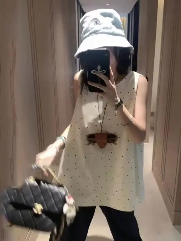 Letni T-shirt w kropki dla kobiet, luźny krój, stylowy strój, casualowy, kreatywny nadruk, bawełniany, okrągły dekolt, regularna długość.