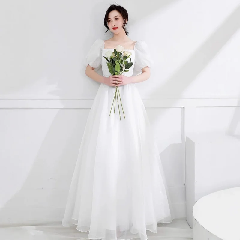 abito-da-sposa-leggero-di-nuovo-stile-manica-a-sbuffo-francese-elegante-semplice-collo-quadrato-abito-da-viaggio-abito-bianco-da-esterno