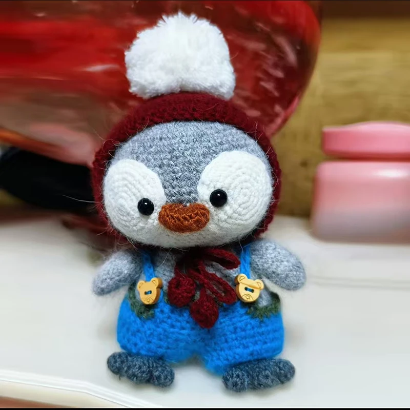 

Cute Hand Crochet Penguin Doll with Red Hat & Blue Overalls, Soft Wool Knitted Plush Toy, Handmade Stuffed Animal Gift for Kids
