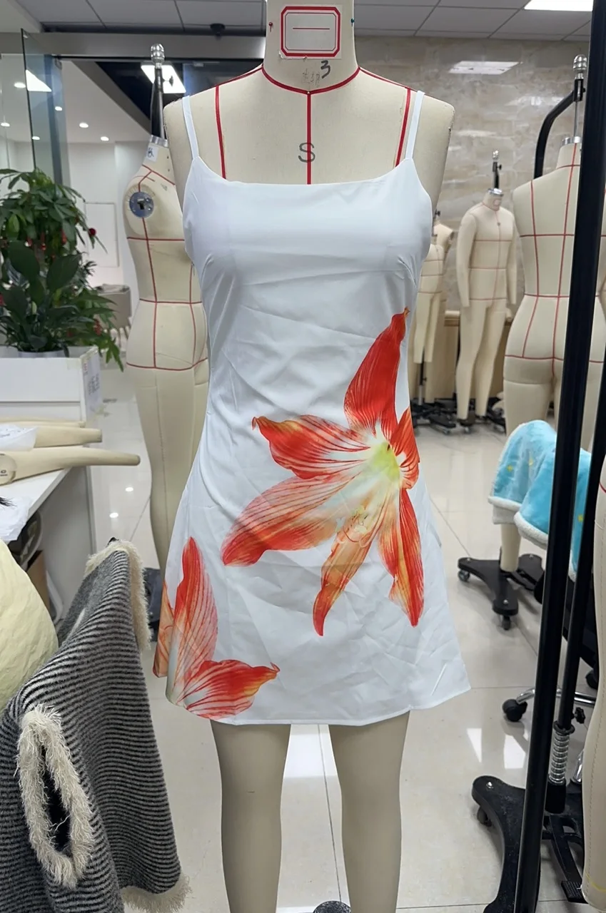 Abito estivo da donna Mini Cami senza maniche con apertura sul retro Abito con cinturino per spaghetti con stampa floreale