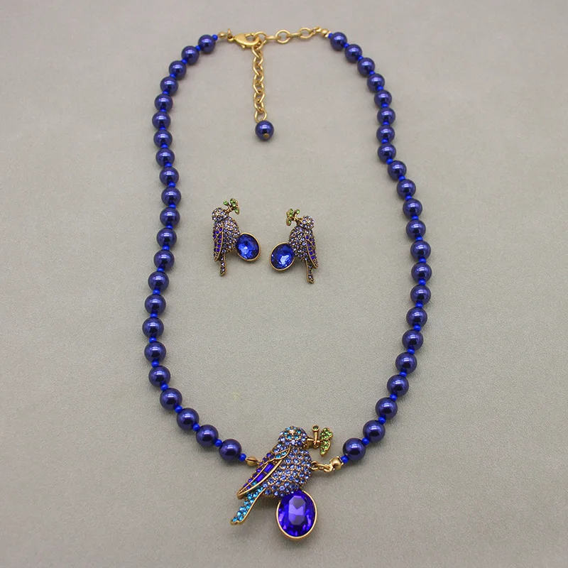 Set of Magpie Necklace, Earrings, and Brooch - Premium Blue Glass Pearl with Antique Gold Plating view 2