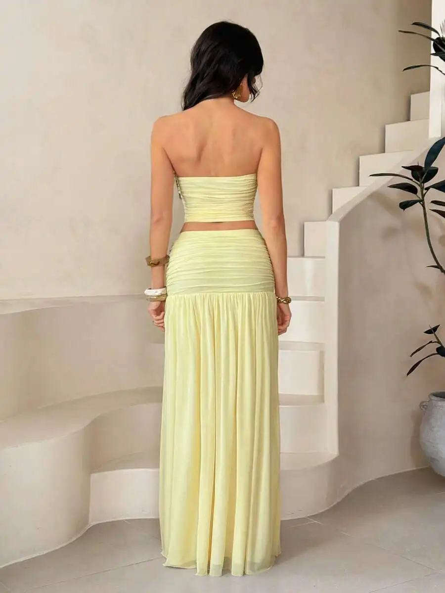 

Lemon Yellow Strapless Crop Top And Flowy Pleated High Waist Maxi Skirt Two Piece Set For Summer Vacation Wear