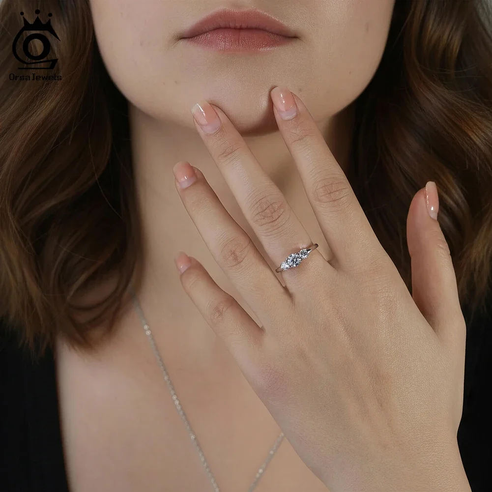

ORSA JEWELS S925 Silver Round Cut D Color Moissanite Diamond Weeding Ring for Women Eternity Moissanite Band Ring Jewelry MOR11