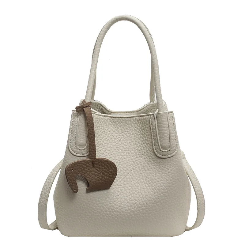 

The stylish small bag is a versatile crossbody bag for women and a super popular hand-held bucket bag