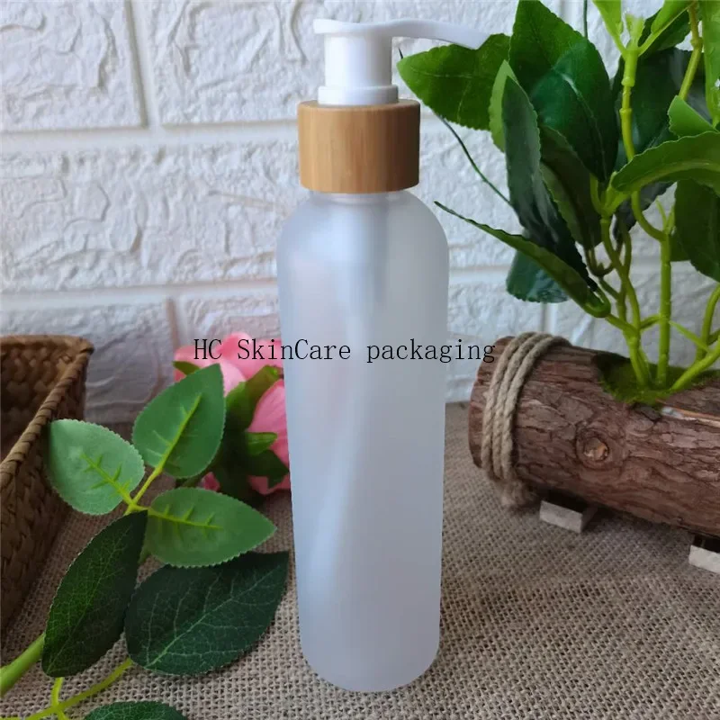 

Custom Logo PET Plastic Bottles with Bamboo Cap Empty Lotion Bottles for Shampoo，soap clean face lotion bottle with wooden caps