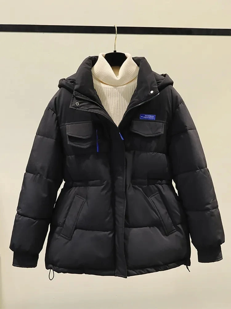 سترة شتوية للسيدات لعام 2025 معطف مبطن بقلنسوة موضة كورية سترات نسائية فضفاضة ودافئة ملابس خارجية من القطن