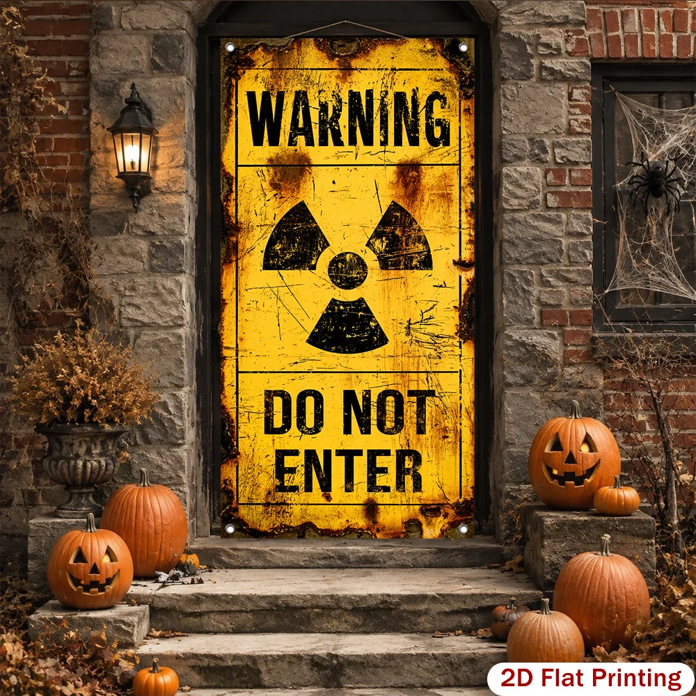 A yellow radiation warning sign printed banner for a Halloween-themed scene setup, with ghostly garden decorations