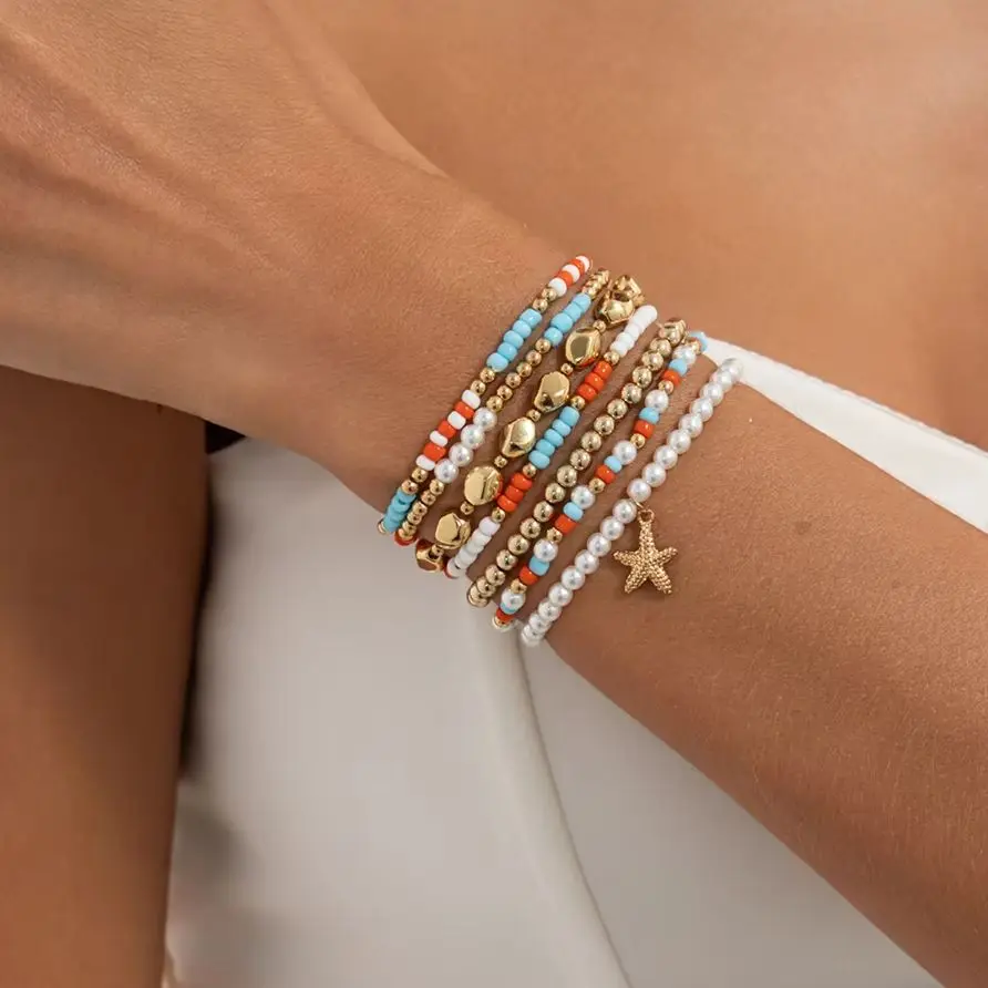 Ingemark 7Pcs/Set Boho Imitation Pearls Rice Beads Resilient Bracelets for Women Trendy Starfish Pendant Bangles Jewelry Gifts