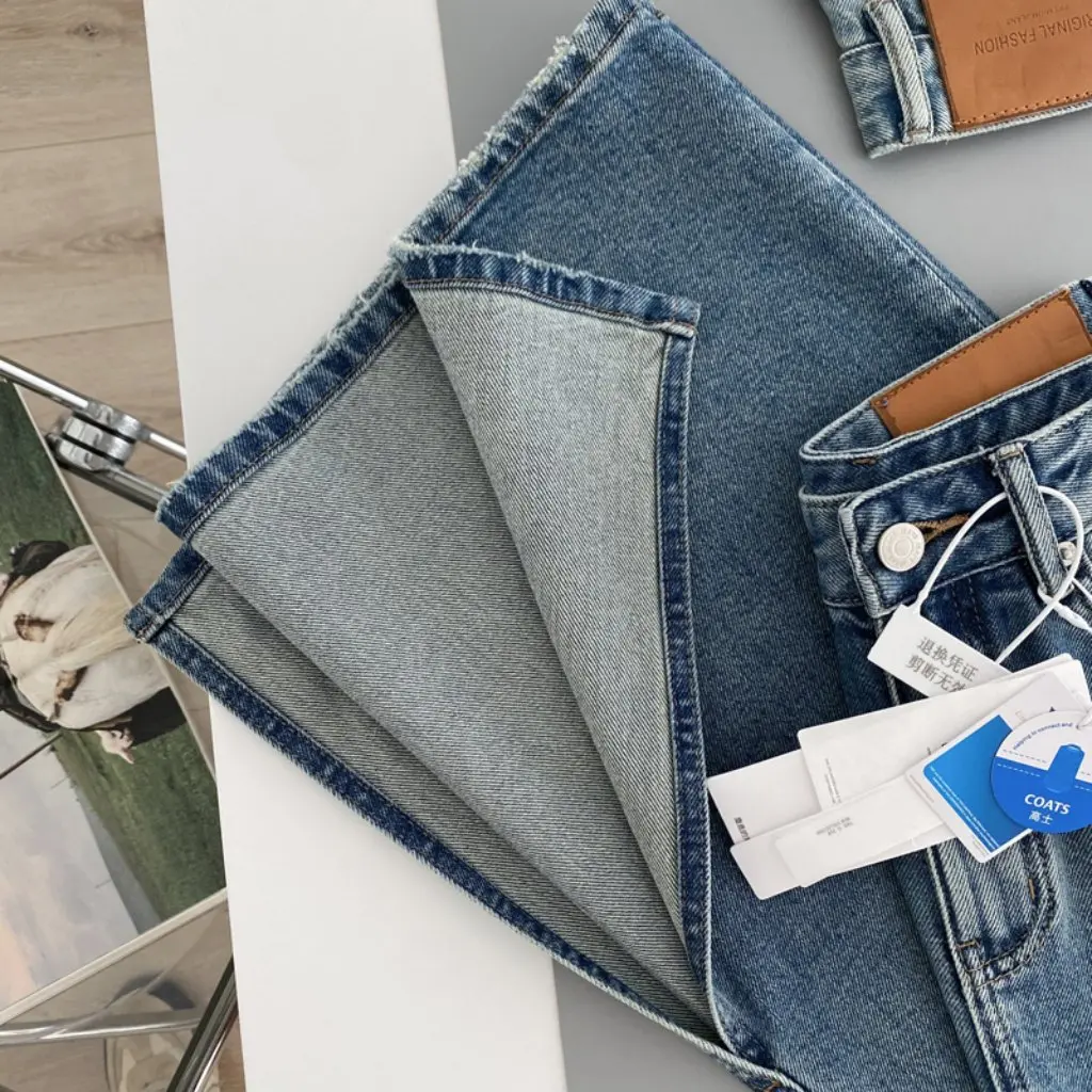 Far Chao Retro mittellanger Jeansrock mit hoher Taille, geteilter Schritt vorne, unbesiegbare Textur, Damenmode, Marktartikel