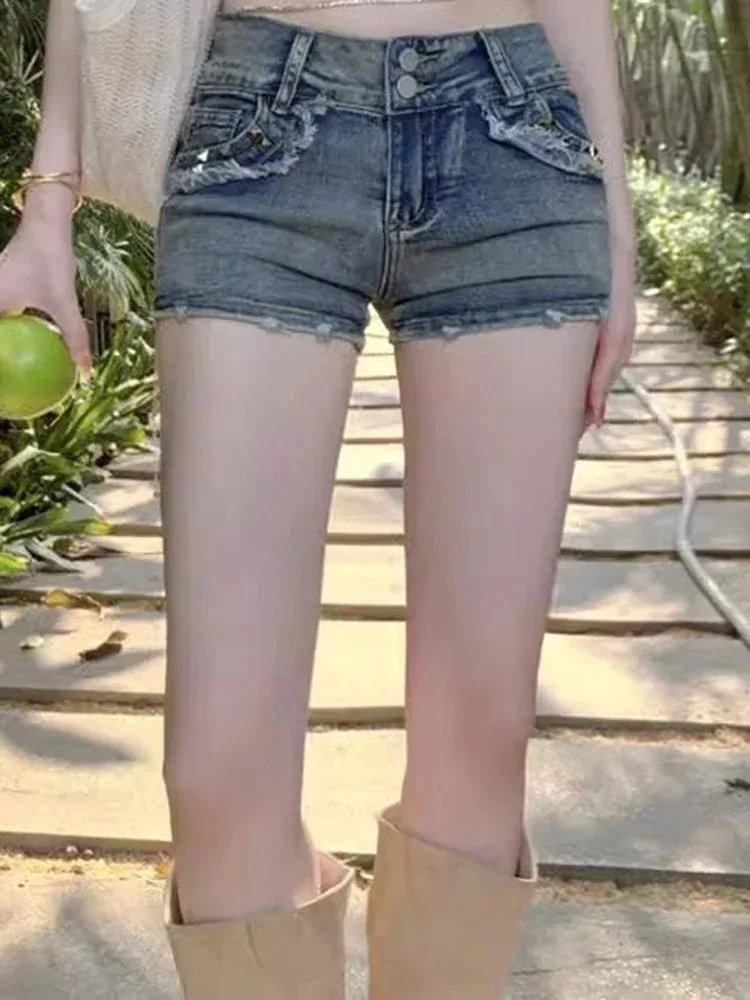 Pantaloncini coreani retrò Y2k da donna Pantaloni Lady Vintage High Street Hot Pants Jeans corti all'anca avvolti elastici a vita bassa blu femminile