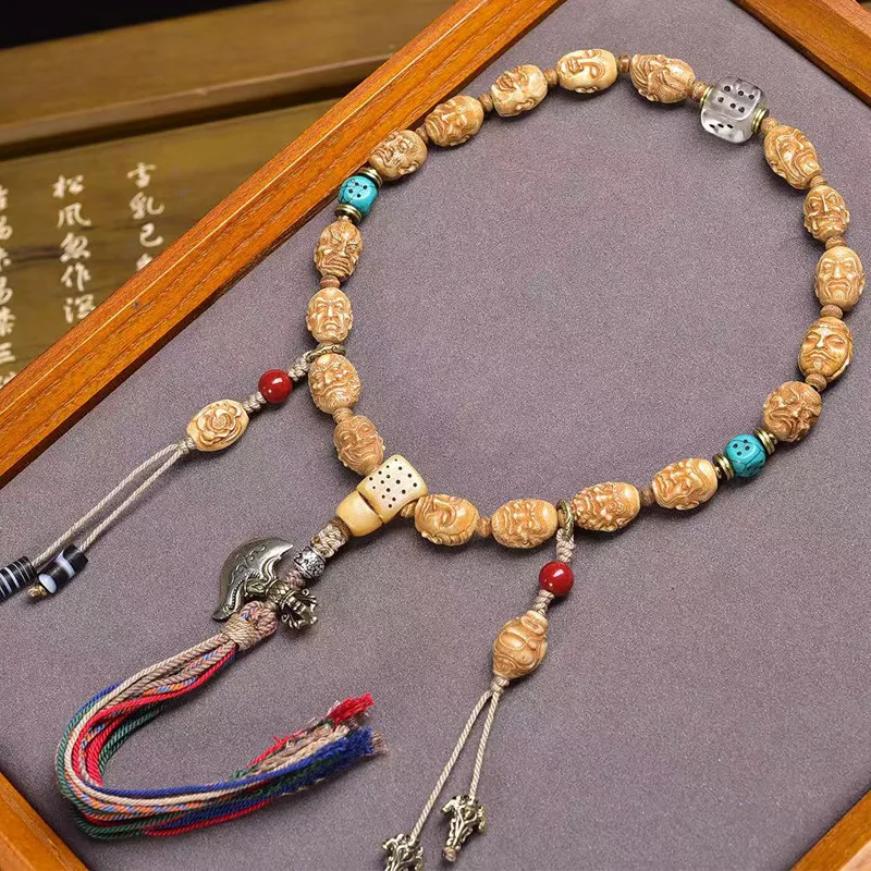 

Возвращенный предмет: резные фигурки восемнадцати архатов, держащих тибетские игральные кости, трехсторонние аксессуары из кости яка и браслет.