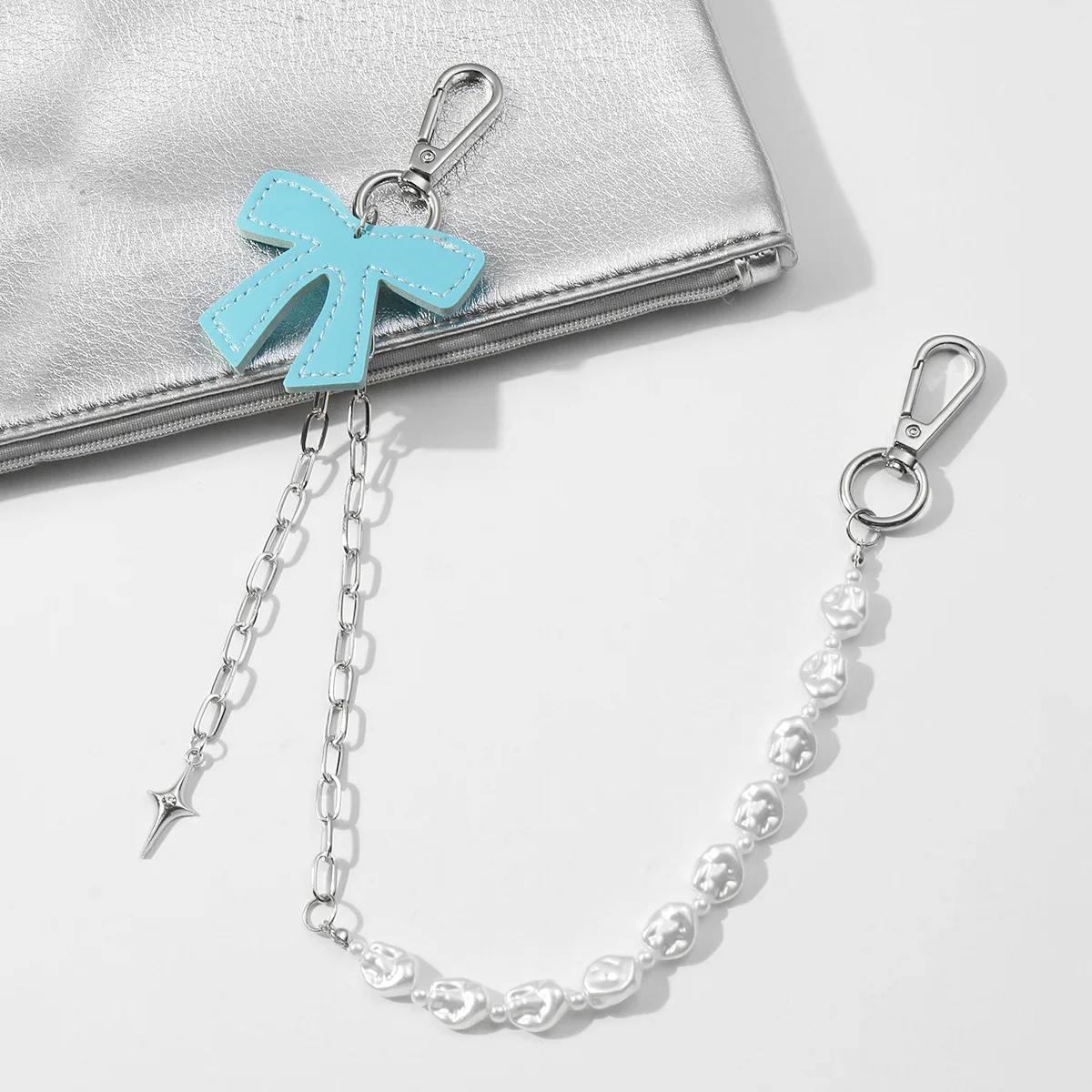 

Cross-border bestseller, trendy and creative blue bow pendant, handcrafted bead bag charm
