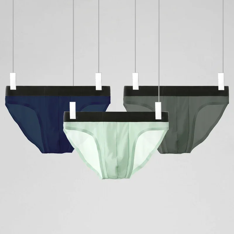 

Мужское нижнее белье из ледяного шелка, бесшовное, ультратонкое, летнее, дышащее, мужские трусы-треугольники, прозрачные, сексуальные, короткие шорты для мужчин и подростков.