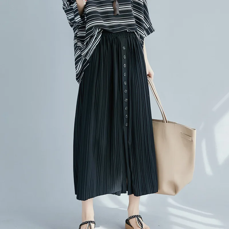 Nouveau 2025 Style coréen bouton plissé mi-longue jupe femmes automne Vintage ample décontracté coton jupes