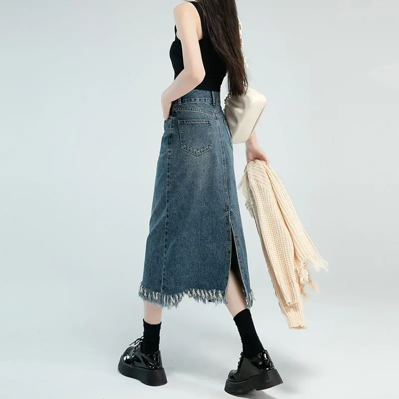 

Trendy high-waisted fringed denim skirt with back slit for women2024Spring new slimming styleaSlim-fit midi skirt