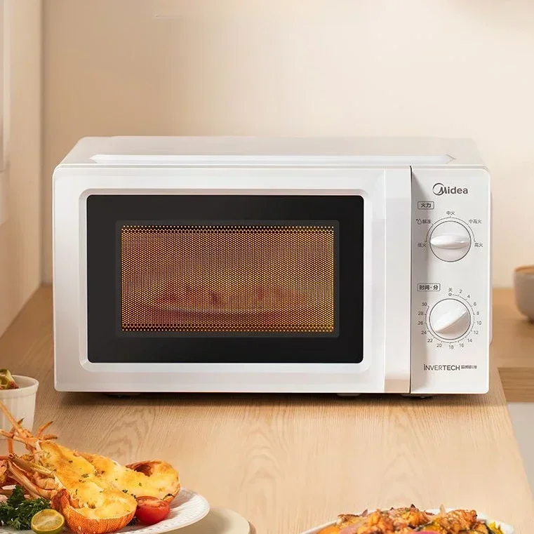 Home microwave oven. Lightweight, portable. Has 5-speed turntable for heat distribution.