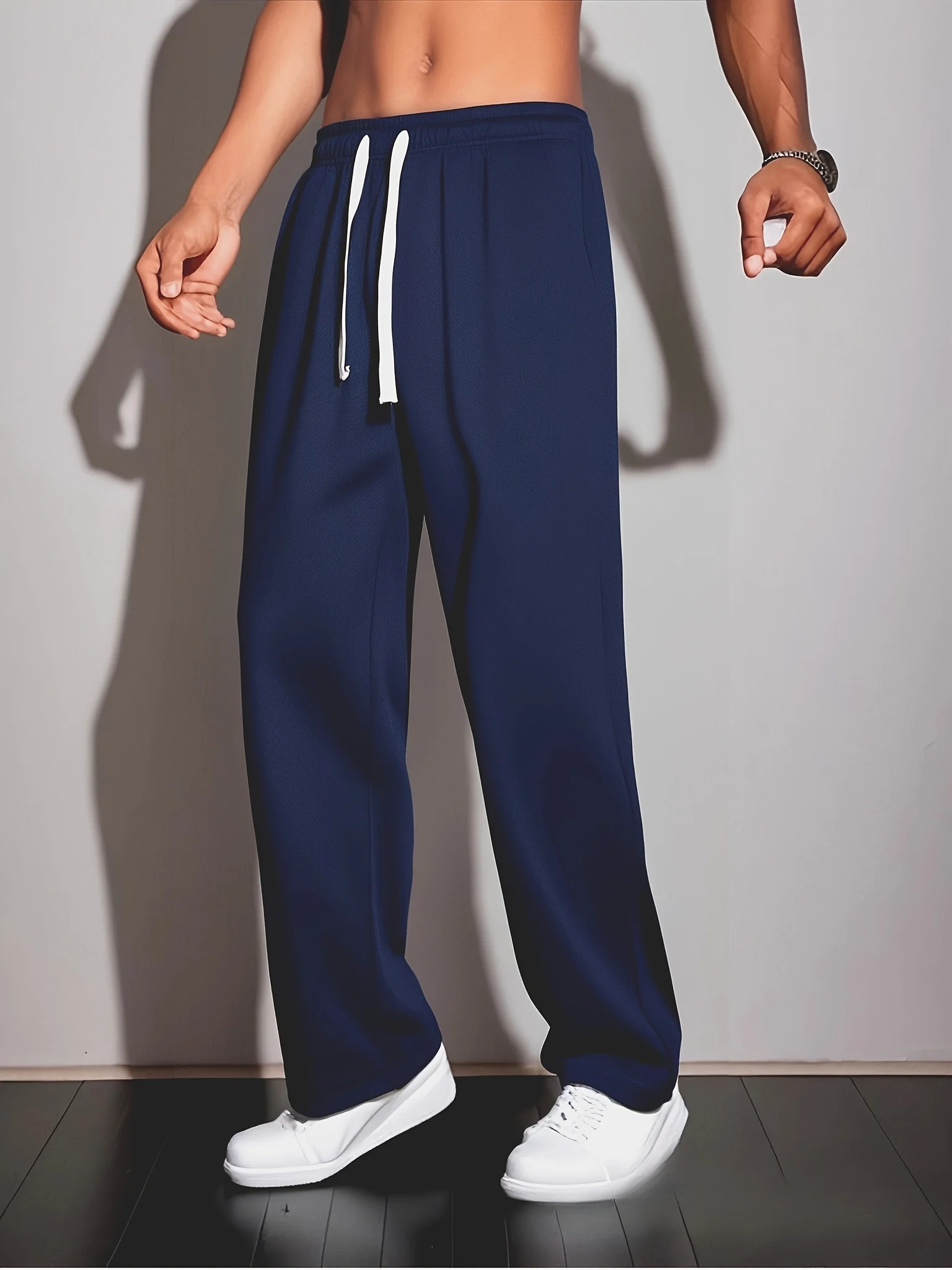 سروال رجالي أنيق للخريف والشتاء بلون سادة وخصر مطاطي واسع الساق مقاس كبير مناسب لكل من الرياضة والأنشطة الخارجية